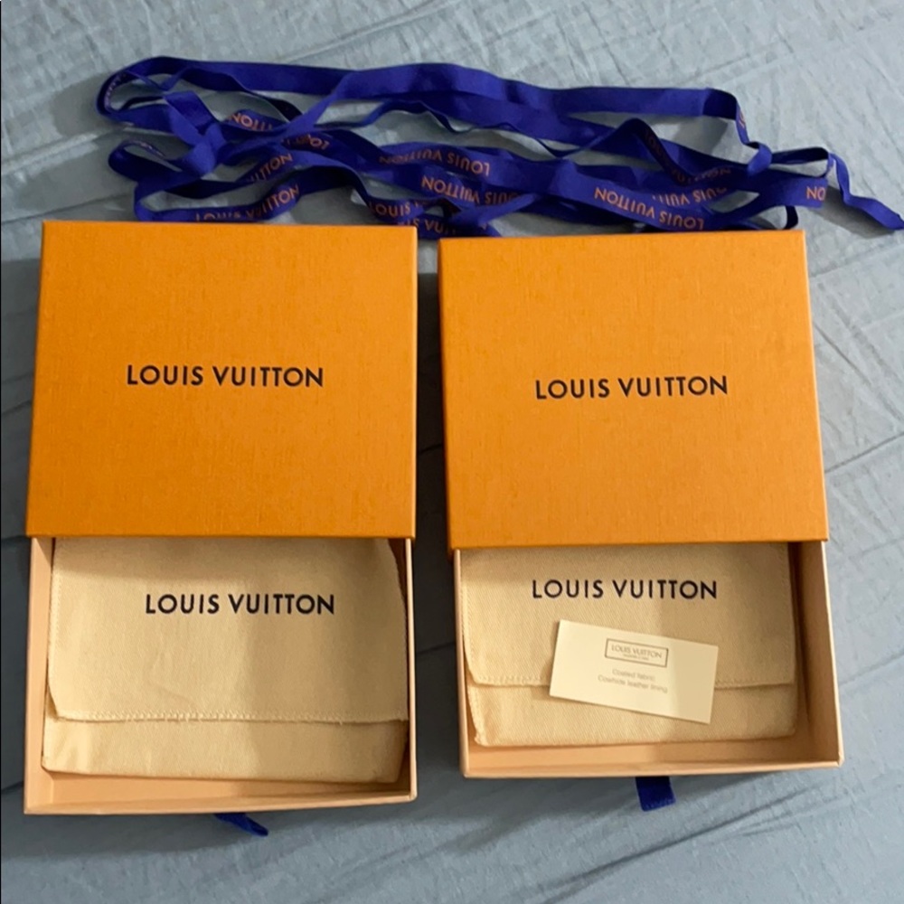 Two small Louis Vuitton boxes